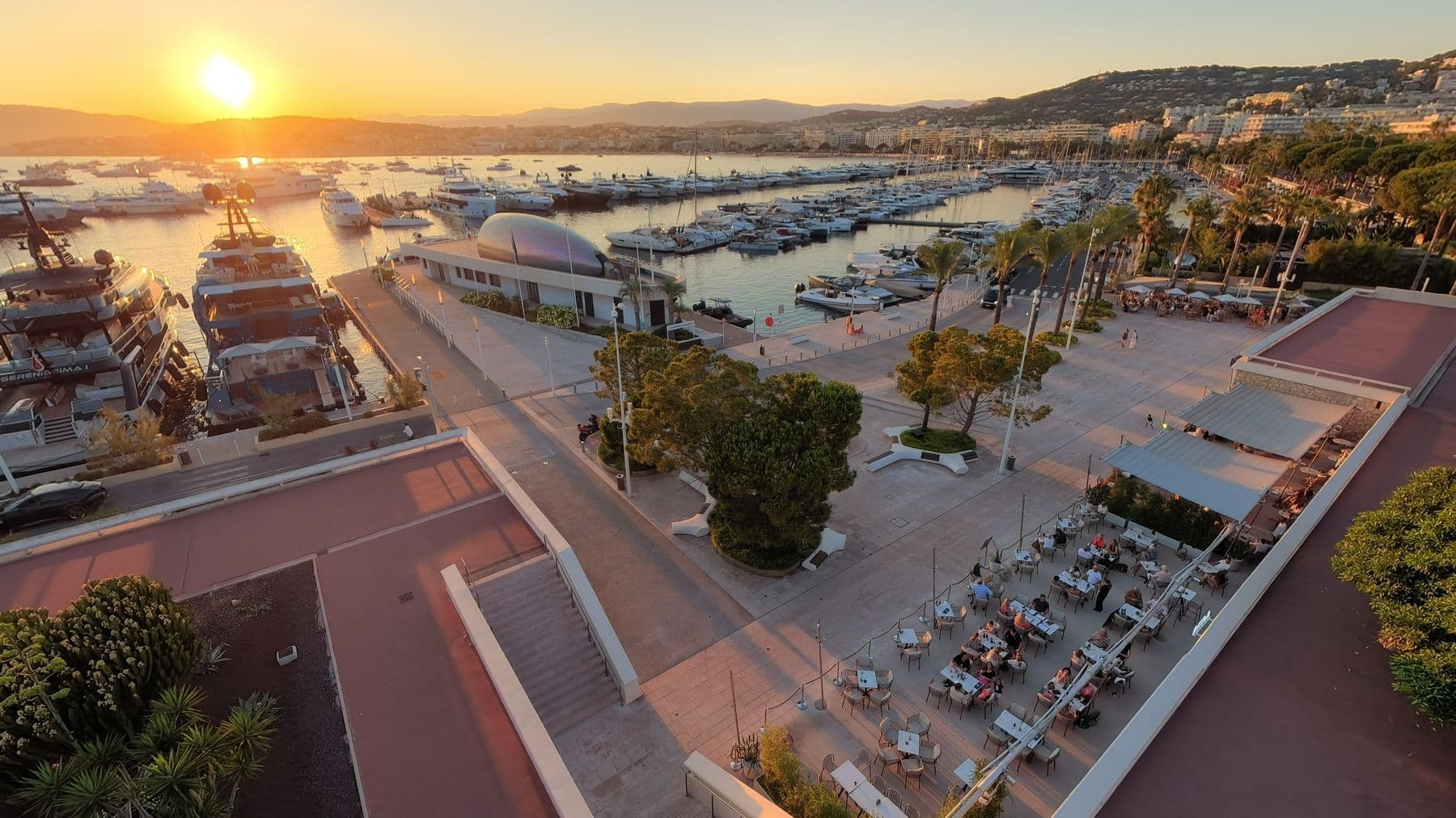 Loma’s terrace and Port Canto at sunset, seen from the drone